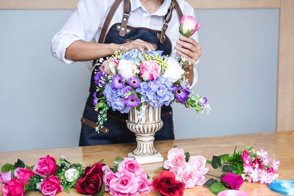 Artificial flower arrangement in Vase