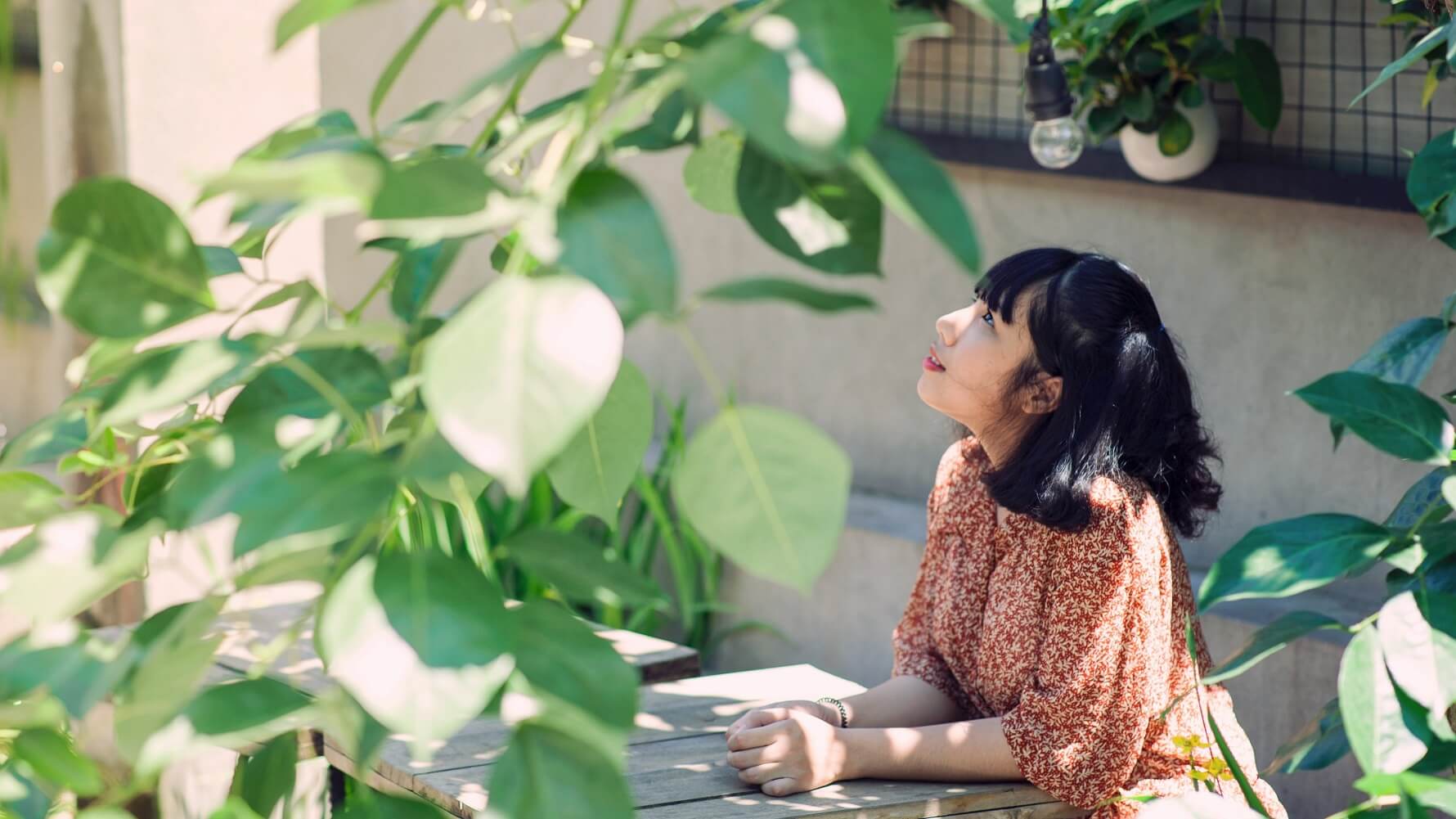 Girl looking at plants