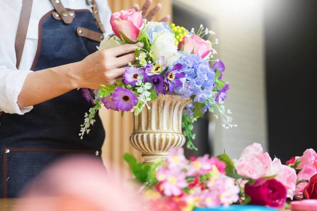 Fake flower arranging in an urn