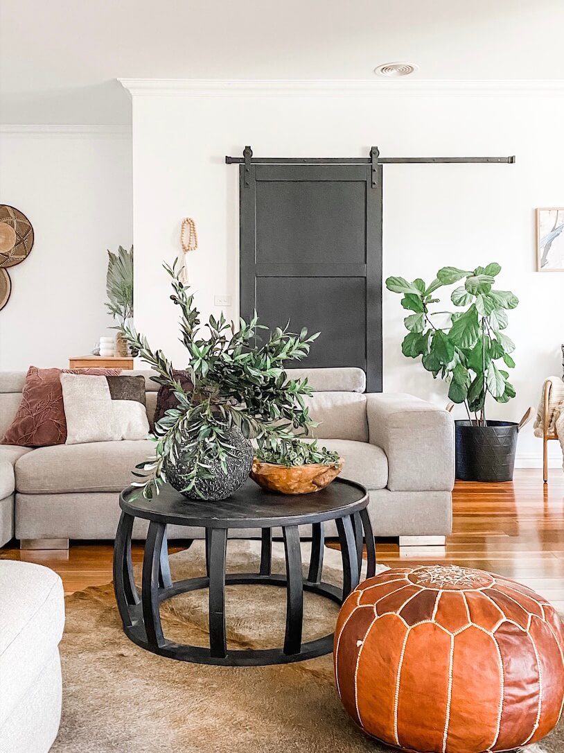 Olive branches on a coffee table in living room