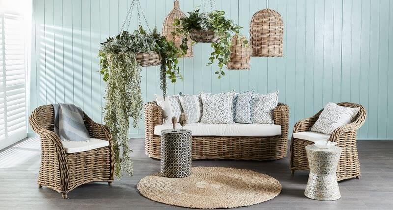 hanging baskets with greenery in a coastal scene