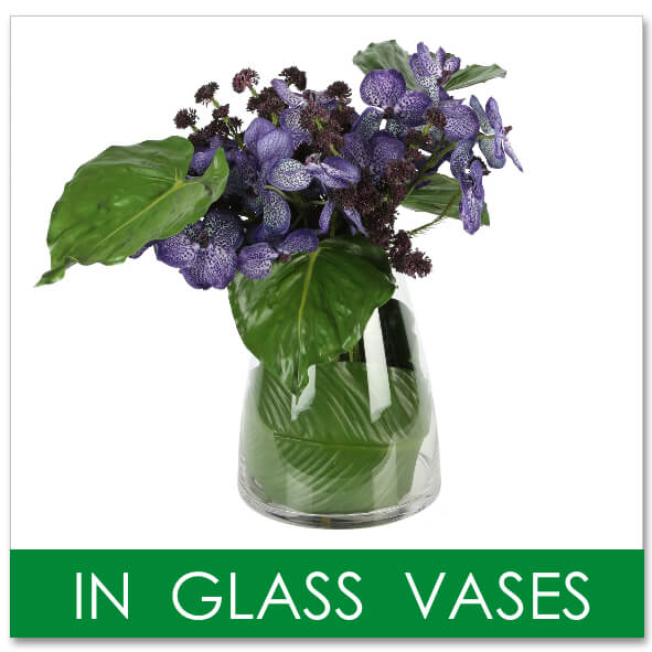 flower arrangements in glass vases